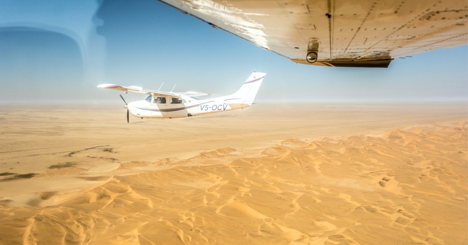 Eagle Eye Aviation Cessna 210 Centurion over the Namib dunes